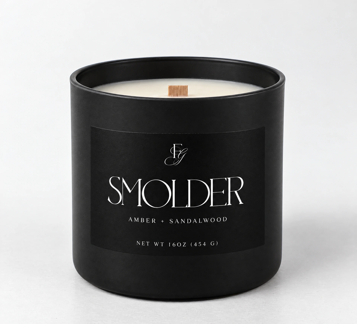 Smolder candle in a matte-black vessel with a single wooden wick