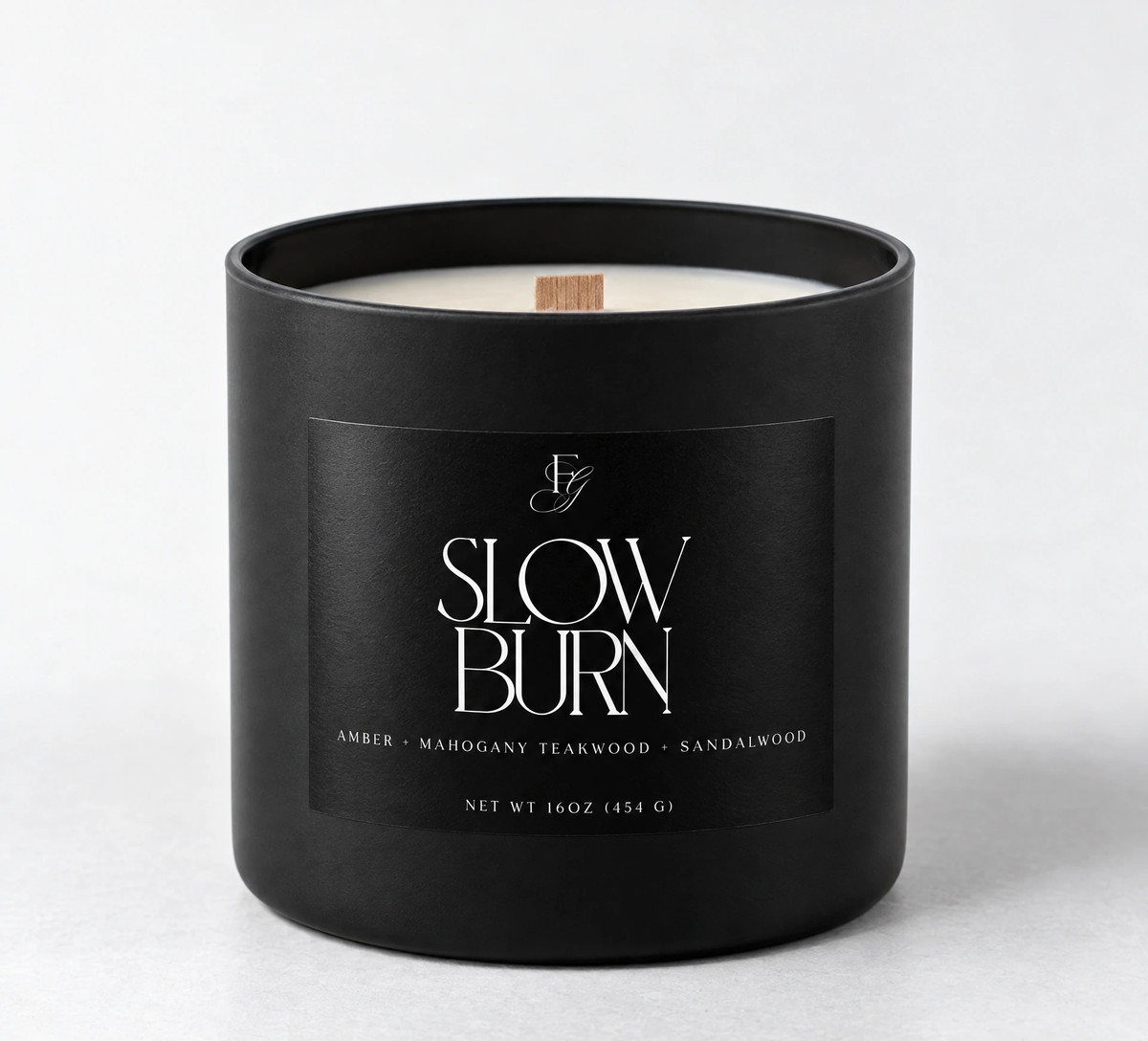Slow Burn candle in a matte-black vessel with a single wooden wick
