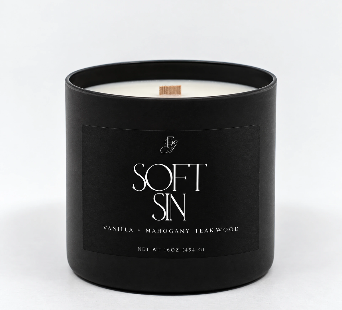 Soft Sin candle in a matte-black vessel with a single wooden wick